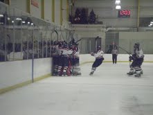 ACHA DI knocks off John Carroll