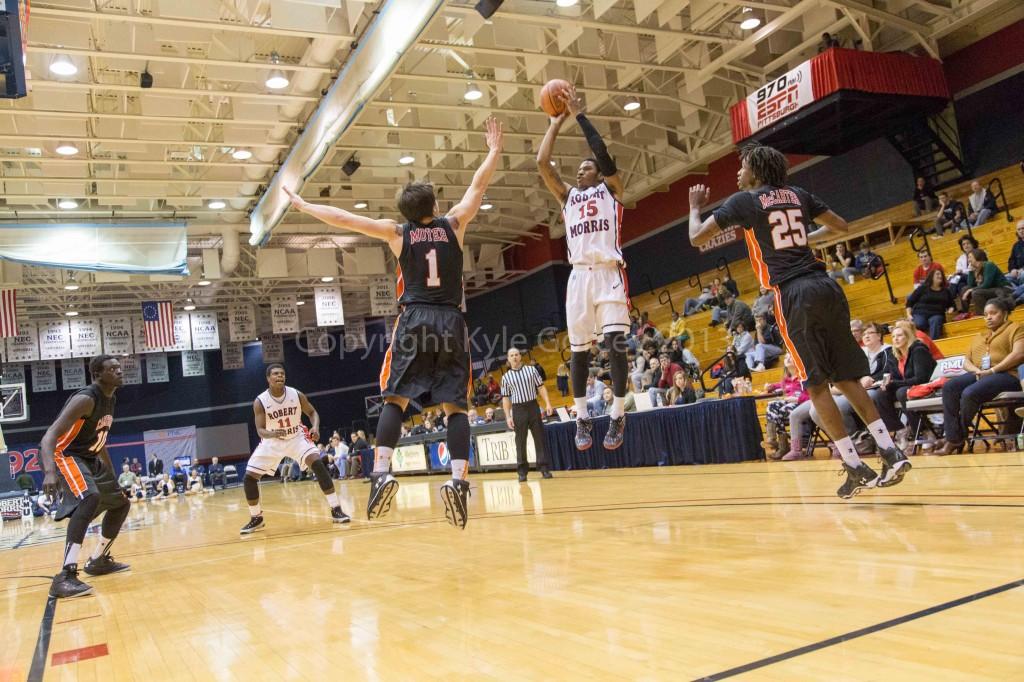 Karvel Anderson takes a jumper from the corner. 