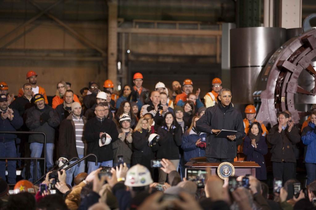 President Barack Obama signs a memorandum for myRA at West Mifflin steel plant Wednesday.