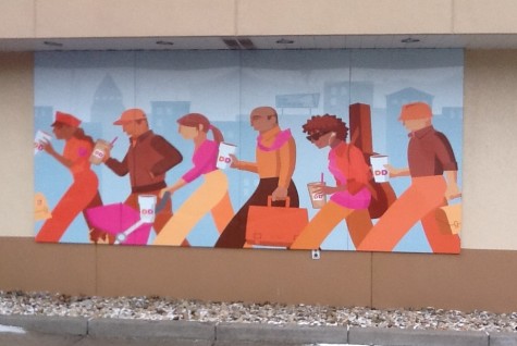 A mural outside the Moon Dunkin Donuts located just off University Boulevard exhibits the friendly environment that exists in the franchise