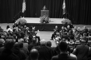 The majority of the audience takes their seat after Dean of Communications Barbra Levine asks for all doctorate graduates to be recognized.