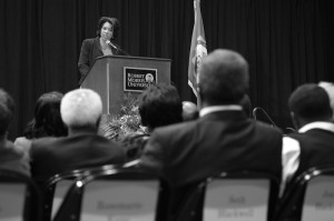 Dr. Daria Crawley encourages the attendees to help continue her husbands work in black male leadership, and the encouragement of young minds. 