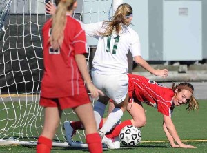 Amanda Kachaylo (bent over in red jersey) will be trading red for purple when she joins the Capital University Crusaders in the fall. Photo courtesy: Amanda Kachalyo.