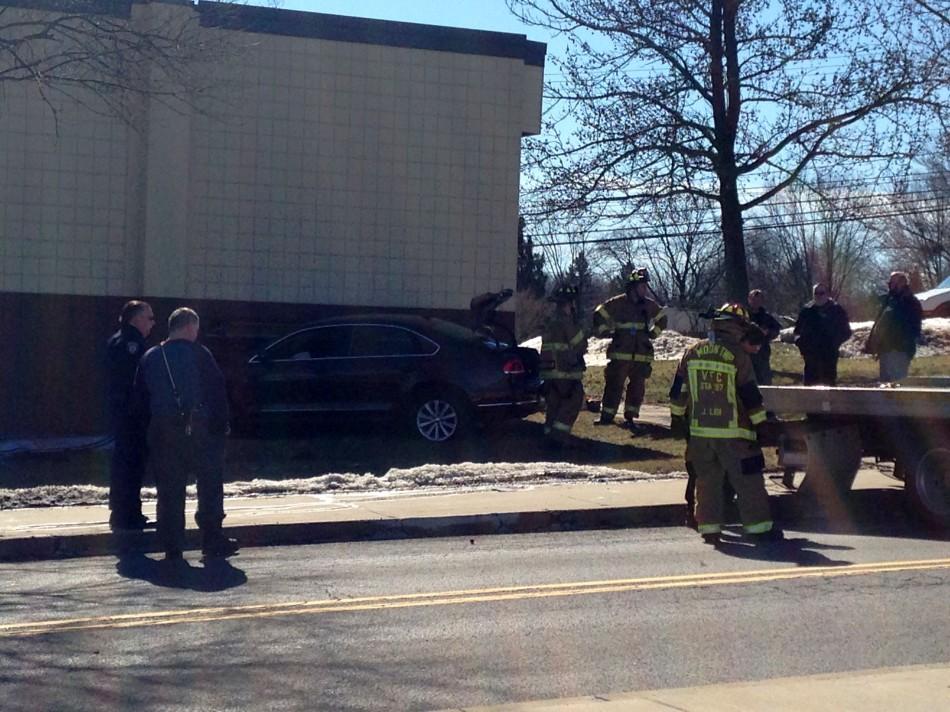 Officials were on the scene following a car crashing into the Revere Center this morning.