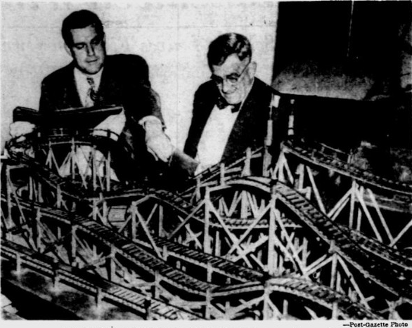 Ed Vettel Sr. (Right) & Ed Vettel Jr. (Left) discuss a roller coaster model & design.  Both Father & Son worked at Pittsburghs West View Park.