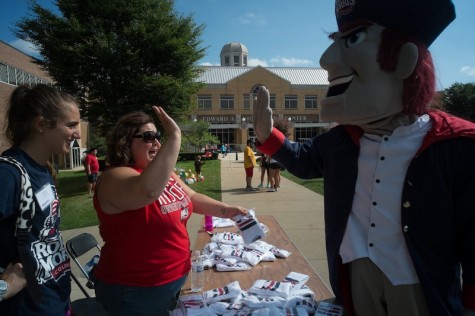 Romo collecting his socks after finishing first in the mascot devision. 