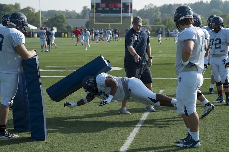 Richardson working with the offensive line on cut blocking at practice on Wednesday, Oct. 1st. 