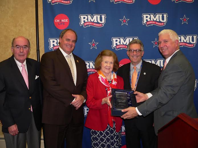 David Synowka inducts the Rooney family into the RMU Sport Management Hall of Fame on October 17. 