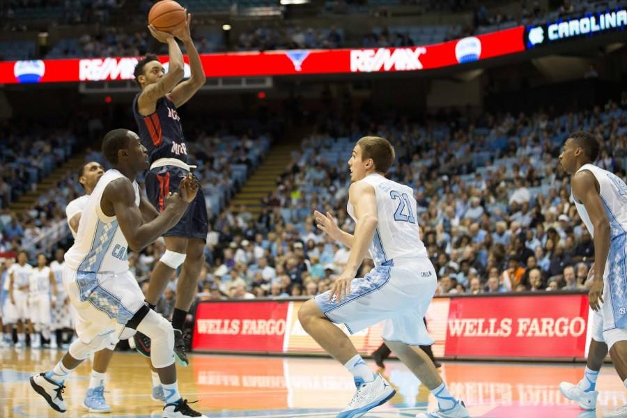 Marcquise Reed takes a jumper from the top of the key at the Dean E. Smith Center against North Carolina Sunday night. 