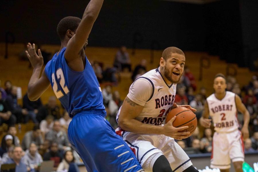 Aaron+Tate+tipped-in+a+Marcquise+Reed+floater+as+time+expired+to+propel+RMU+to+a+53-52+win+over+CCSU.+