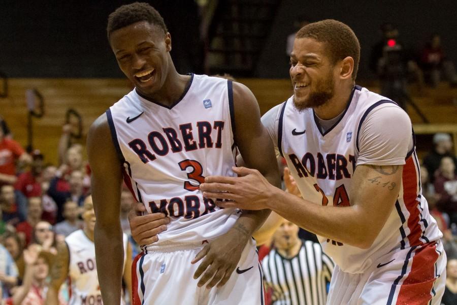 Aaron Tate and Kavon Stewart combined for 23 points Friday to help their team pick up win number one.