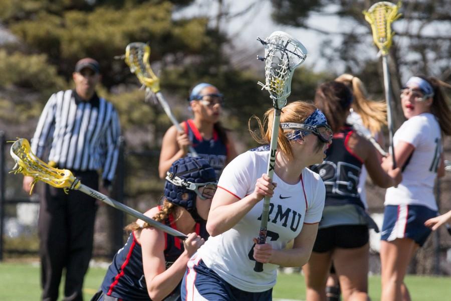 Dana Davis netted two goals against Detroit Friday but the Colonials fell one score short of the victory.