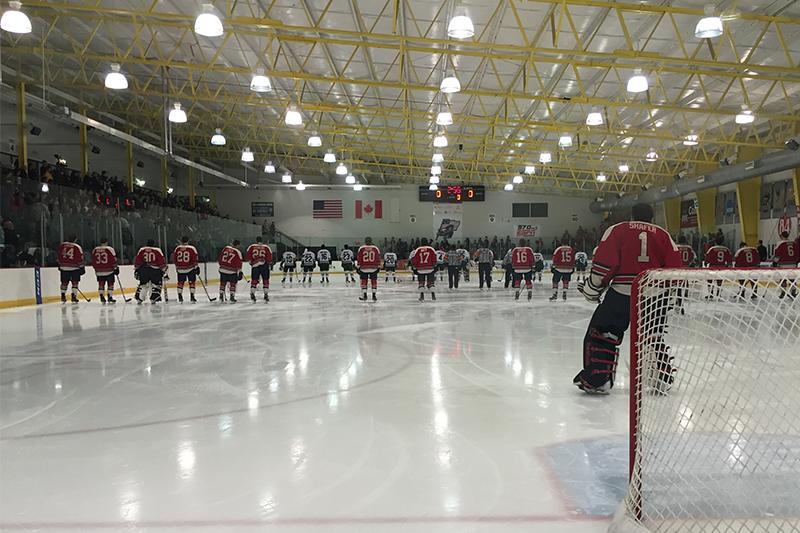 A packed 84 Lumber Arena crowd looks on as players line up for the National Anthem before RMU vs. Mercyhurst.