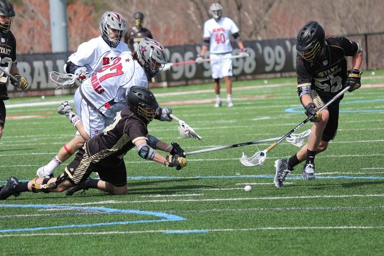 Senior midfielder Chris Barney fights for possession of the ground ball against Bryant