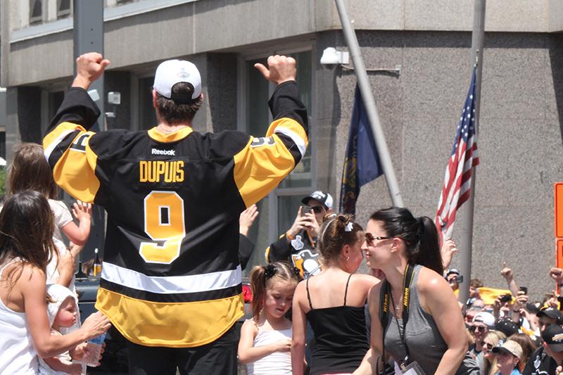 Fan favorite, Pascal Dupuis, who retired midseason due to health issues, stands as the crowd chants his name.