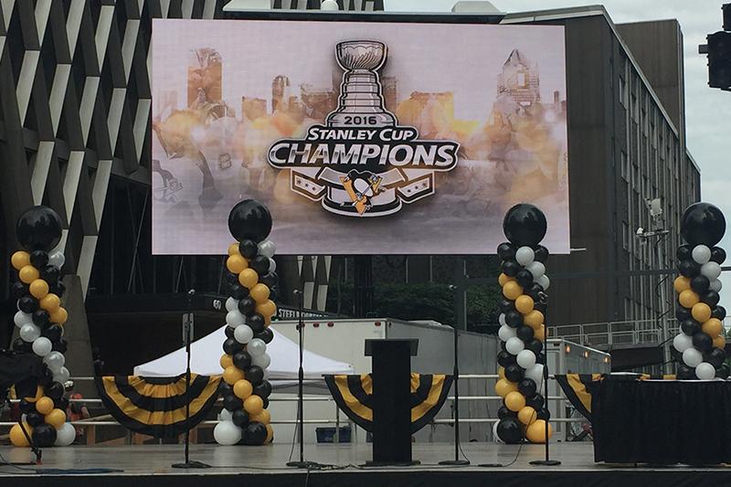 The stage marks the end of the parade route and is home to the closing ceremony.