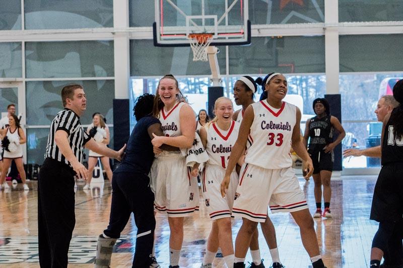 Megan Smith celebrates with teammates after draining game-winning shot against Saint Francis. Moon Township, PA. Saturday January 13, 2017 (RMU Sentry Media/Morgan Torchia)