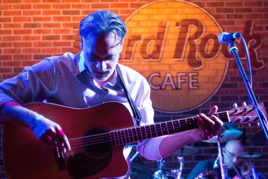 Vidhu “Vee” Sharma performing on the acoustic guitar at the Hard Rock Cafe. Pittsburgh, PA. March 3, 2018. Garret Roberts/RMU Sentry Media