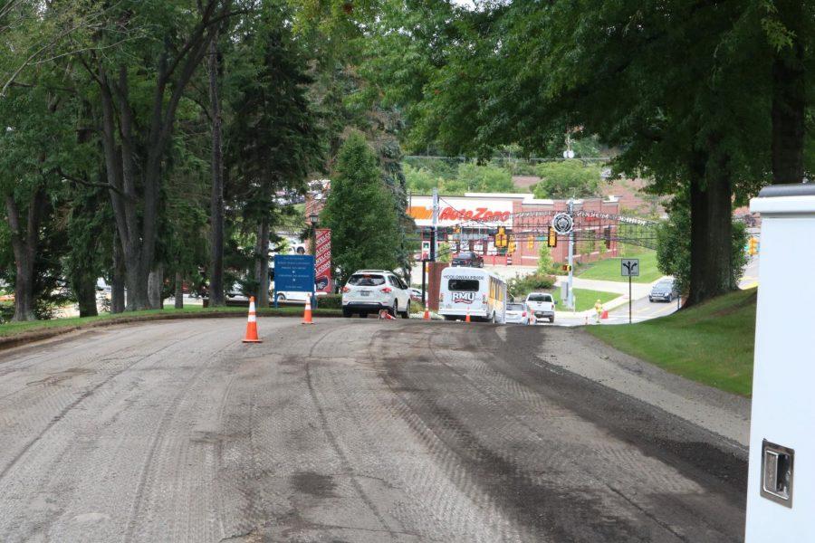 Construction crews milled the entrance to Robert Morris university on Monday, August 20, 2018.