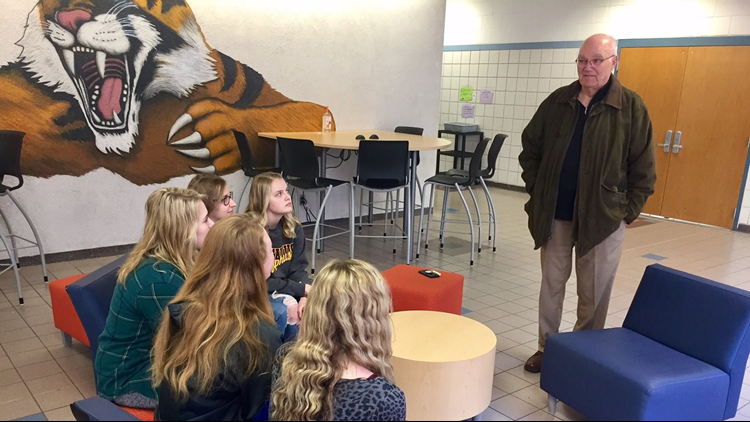 Dennis Frandsen chats with seniors at Rush City High School. (Photo: Boyd Huppert, KARE 11)