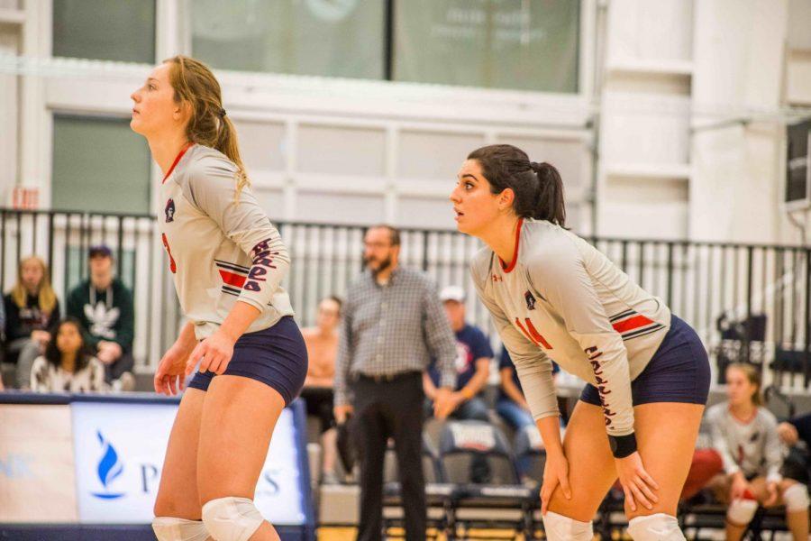 Taylor Lord(right) and Erika Wilt(left) anticipate the next point during their 3-set sweep of the FDU Knights.