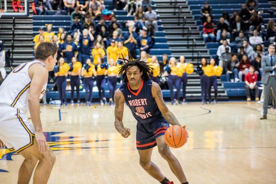 PHILADELPHIA — Koby Thomas drives to the hoop against Drexel on December 1, 2018 (David Auth/RMU Sentry Media). Koby Thomas has only appeared in three games since the 82-69 loss to Drexel. Photo credit: David Auth