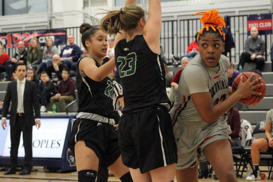 MOON TOWNSHIP -- Nneka Ezeigbo looks to drive to the hoop against Wagner on January 26, 2019 (Michael Sciulli/RMU Sentry Media). Eziegbo had a career night as she finished with a double-double of 13 points and 17 rebounds. Photo credit: Samuel Anthony