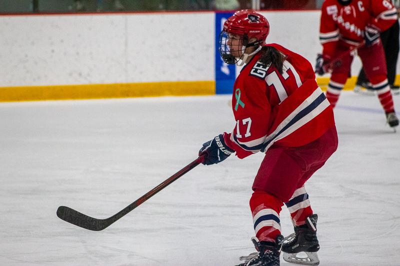 Jaycee Gebhard skates back in the defensive zone during an offensive opportunity for RIT.