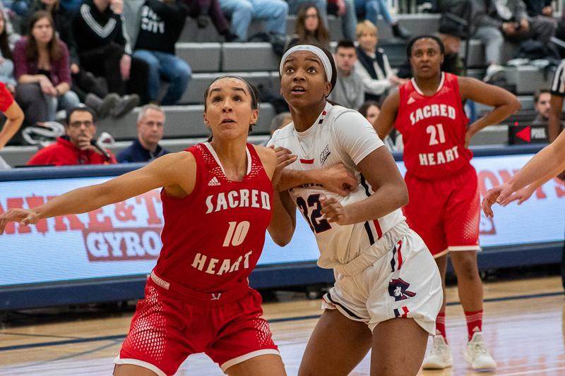 Nadege Pluviose gets boxed out by her defender. Moon Twp, PA Jan. 28, 2019. (RMU Sentry Media/Samuel Anthony)