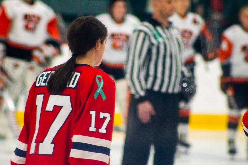 Jaycee Gebhard stands along with her teammates during the National Anthem. Neville Island, PA Friday Jan. 25, 2019. (RMU Sentry Media/Michael Sciulli)