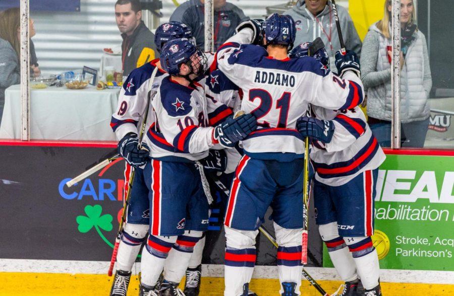 PITTSBURGH -- The Robert Morris Colonials celebrate after a goal against Bowling Green (David Auth/RMU Sentry Media).