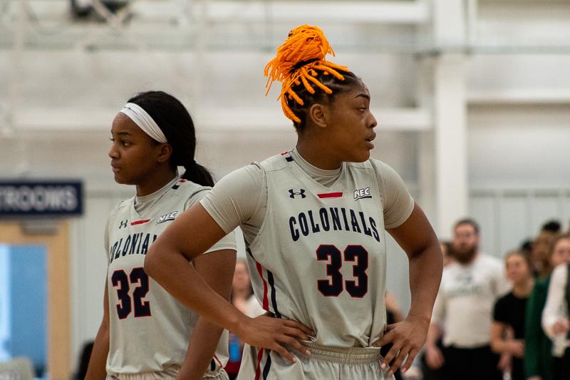 MOON TOWNSHIP -- Nadege Pluviose (left) and Nneka Eziebo (right) take a break during the game against Wagner on January 26, 2019 (Samuel Anthony/RMU Sentry Media)