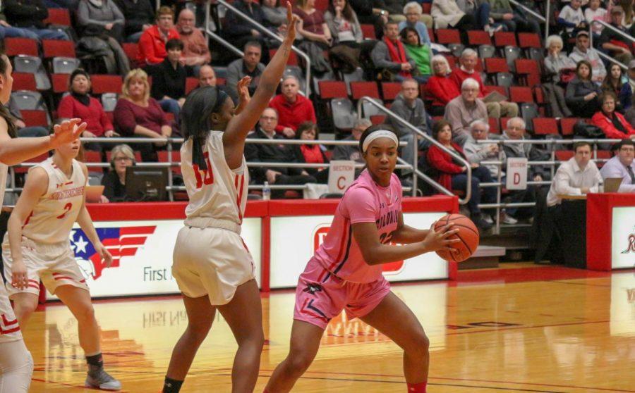 LORETTO, Pa. -- Nadege Pluviose looks for an outlet pass against Saint Francis on February 28, 2019 (Samuel Anthony/RMU Sentry Media).