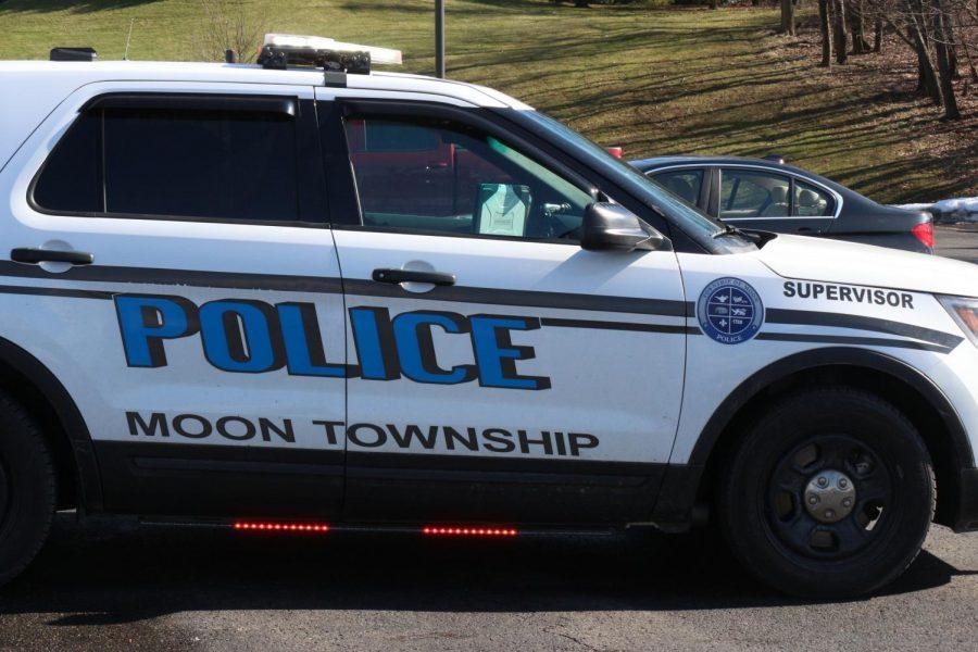 Moon Township and Robert Morris Police search a vehicle in the parking lot of the Benjamin Rush Center.