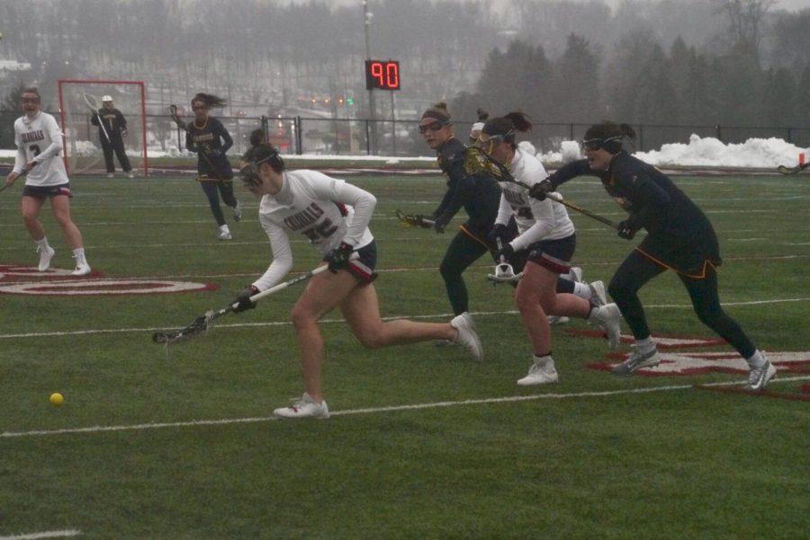 MOON TOWNSHIP -- A pair of Colonials chase the ball while being followed by their opponents (Tim Kelly/RMU Sentry Media).