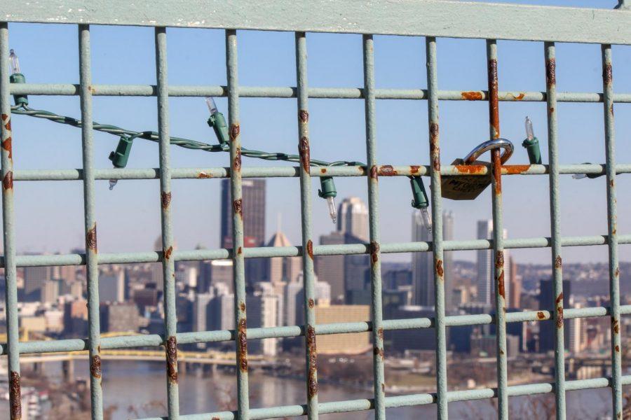Downtown Pittsburgh seen through a fence from West End Park on a February afternoon. 