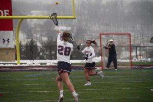 MOON TOWNSHIP -- Hannah Miller passes the ball against Canisius on Feburary 20, 2019 (Tim Kelly/RMU Sentry Media).