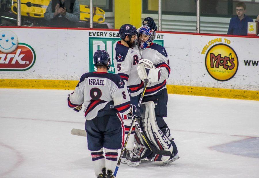 PITTSBURGH -- The Colonials celebrate a victory over RIT (David Auth/RMU Sentry Media).