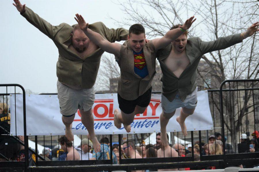 Plungers jump into the cold water during the 2019 Pittsburgh Polar Plunge. Photo Credit: (Flickr/Special Olympics Pennsylvania)