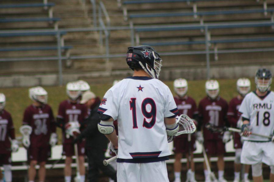 MOON TOWNSHIP -- Midfielder Tyson Gibson waits on the field during a game against Bellarmine on Feb. 23, 2019 (Avin Patel/RMU Sentry Media). Gibson is one of two Colonials that were drafted into Major League Lacrosse.