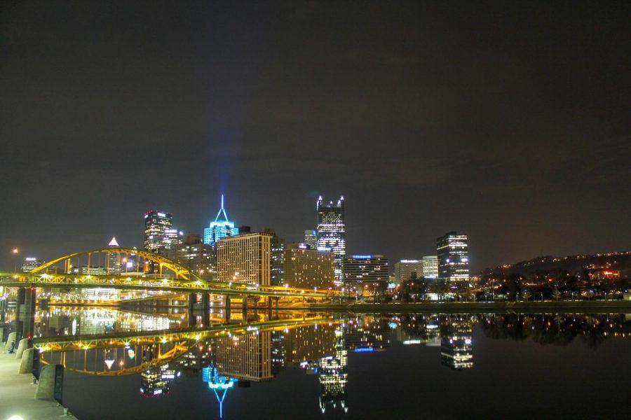 Bridges and buildings in Downtown Pittsburgh reflect off the citys mirror-like rivers on an early spring morning. Photo Date: March 29, 2019 Photo Credit: (RMU Sentry Media/Gage Goulding)