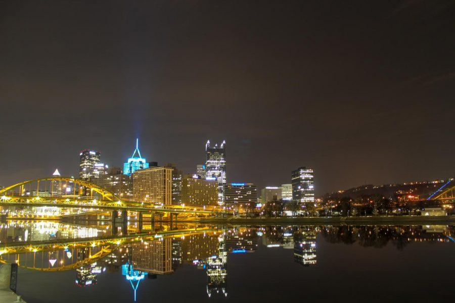 Bridges and buildings in Downtown Pittsburgh reflect off the citys mirror-like rivers on an early spring morning. Photo Date: March 29, 2019 Photo Credit: (RMU Sentry Media/Gage Goulding)