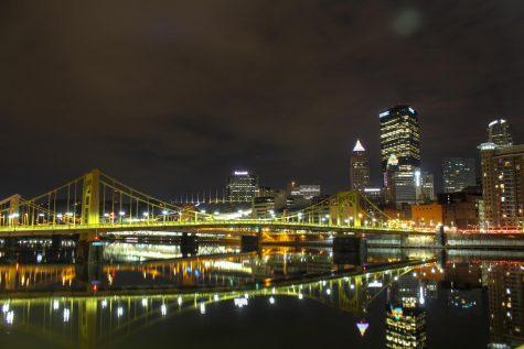 Bridges and buildings in Downtown Pittsburgh reflect off the citys mirror-like rivers on an early spring morning. Photo Date: March 29, 2019 Photo Credit: (RMU Sentry Media/Gage Goulding)