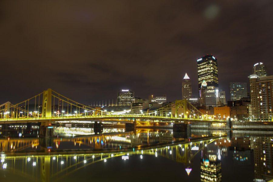 Bridges and buildings in Downtown Pittsburgh reflect off the citys mirror-like rivers on an early spring morning. Photo Date: March 29, 2019 Photo Credit: (RMU Sentry Media/Gage Goulding)