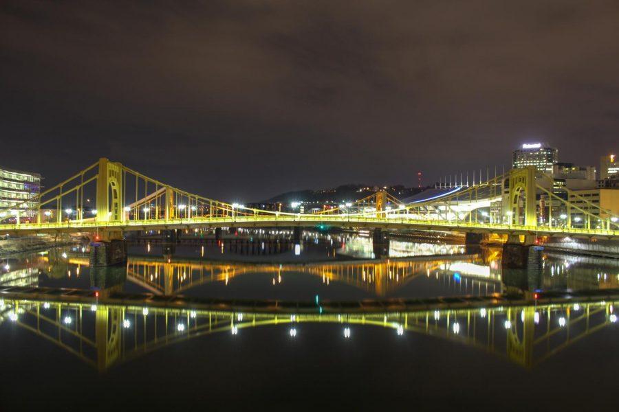 Bridges and buildings in Downtown Pittsburgh reflect off the citys mirror-like rivers on an early spring morning. Photo Date: March 29, 2019 Photo Credit: (RMU Sentry Media/Gage Goulding)