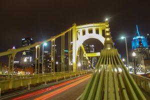 A car drives over the Roberto Clemente Bridge into downtown Pittsburgh. Photo Date: March 29, 2019. Photo Credit: (RMU Sentry Media/Gage Goulding)