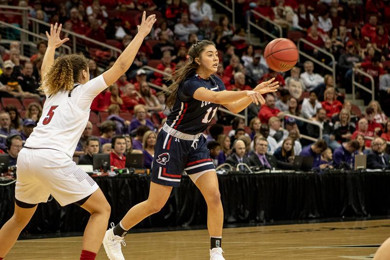 Natalie Villaflor sends over the pass during her career day in the first round of the NCAA tournament. Louisville, KY March 22, 2019. (Samuel Anthony/RMU Sentry Media)