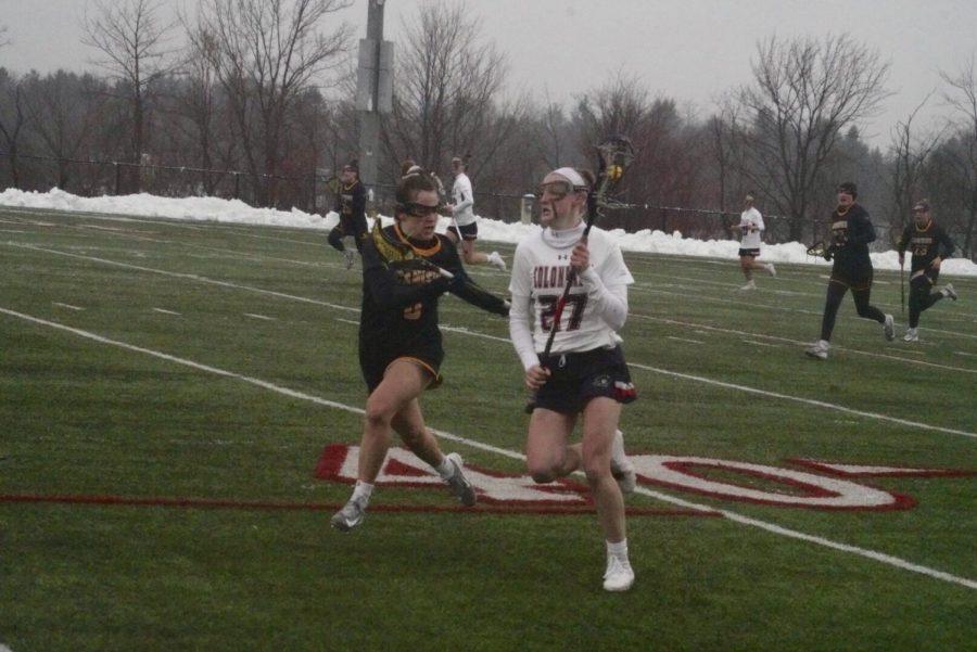 MOON TOWNSHIP -- Clio Kerr runs with the ball against Canisius on February 20, 2019 (Tim Kelly/RMU Sentry Media).