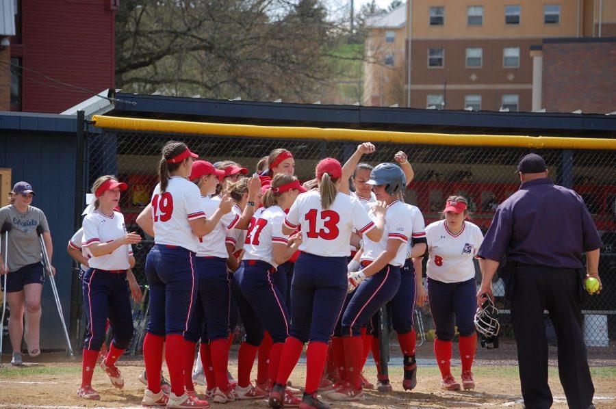 Softball splits another doubleheader