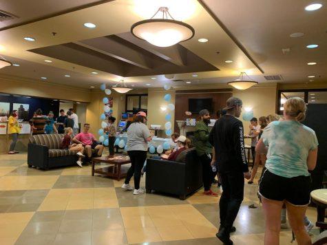 Students gathered in the Yorktown lobby to mingle and learn about German culture. Photo credit: Kassandra Boyd